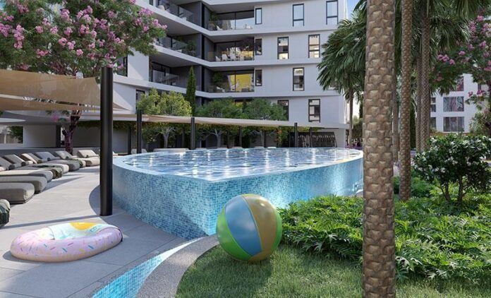 Imagem de um conjunto de apartamentos luxuosos em uma localização ideal, com um fundo que apresenta uma construção moderna e piscina.