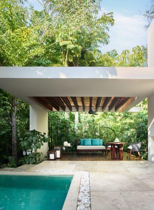 Casita do Chablé Yucatán rodeada por vegetação tropical.